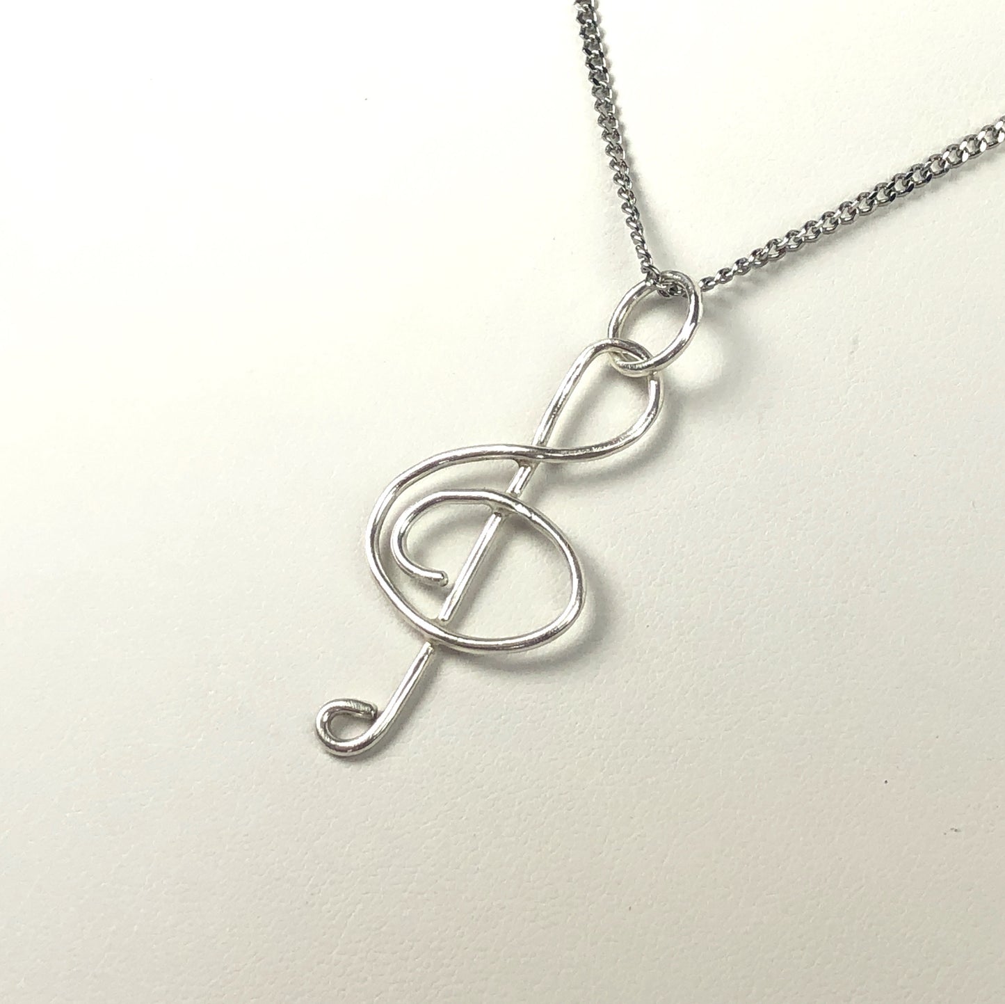 Treble clef pendant