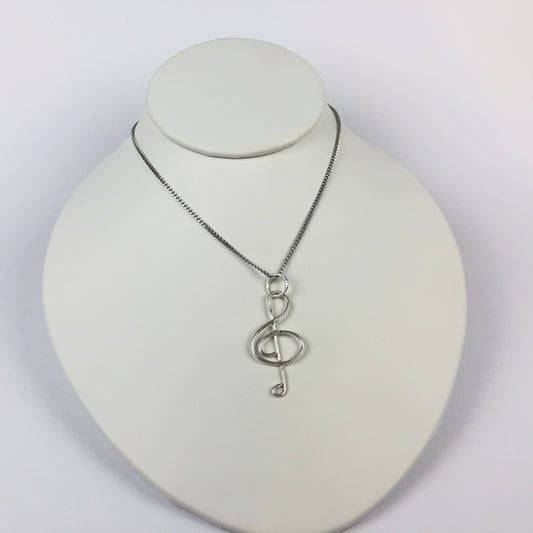 Treble clef pendant